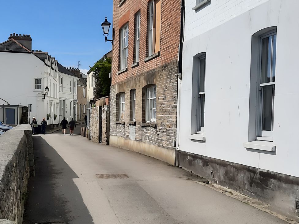 A street with buildings and people at Lil Nauti in 