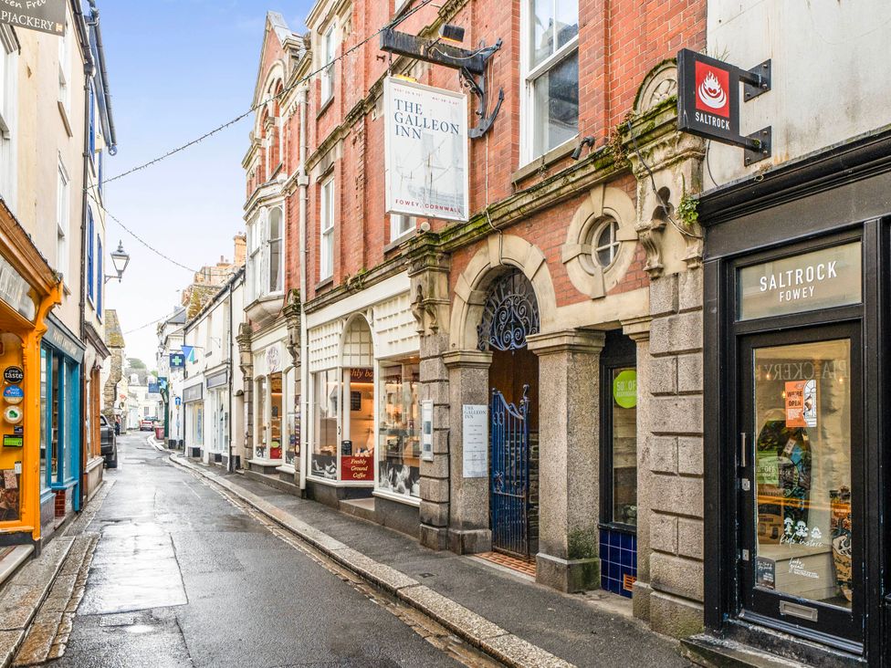 A street view showing shops and buildings at Lil Nauti in Fowey
