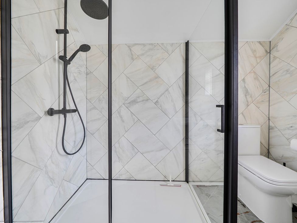 A bathroom with a shower and toilet at 140 Finchley Road in Ipswich