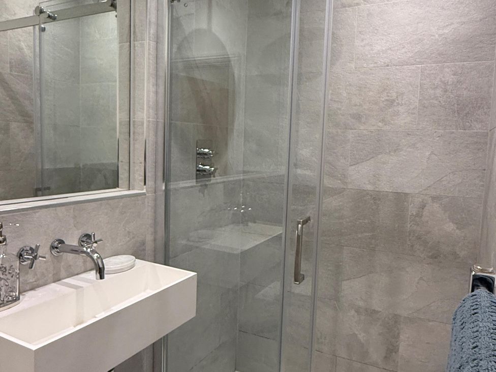 A bathroom with a sink and shower at Seaside Bliss in Brighton