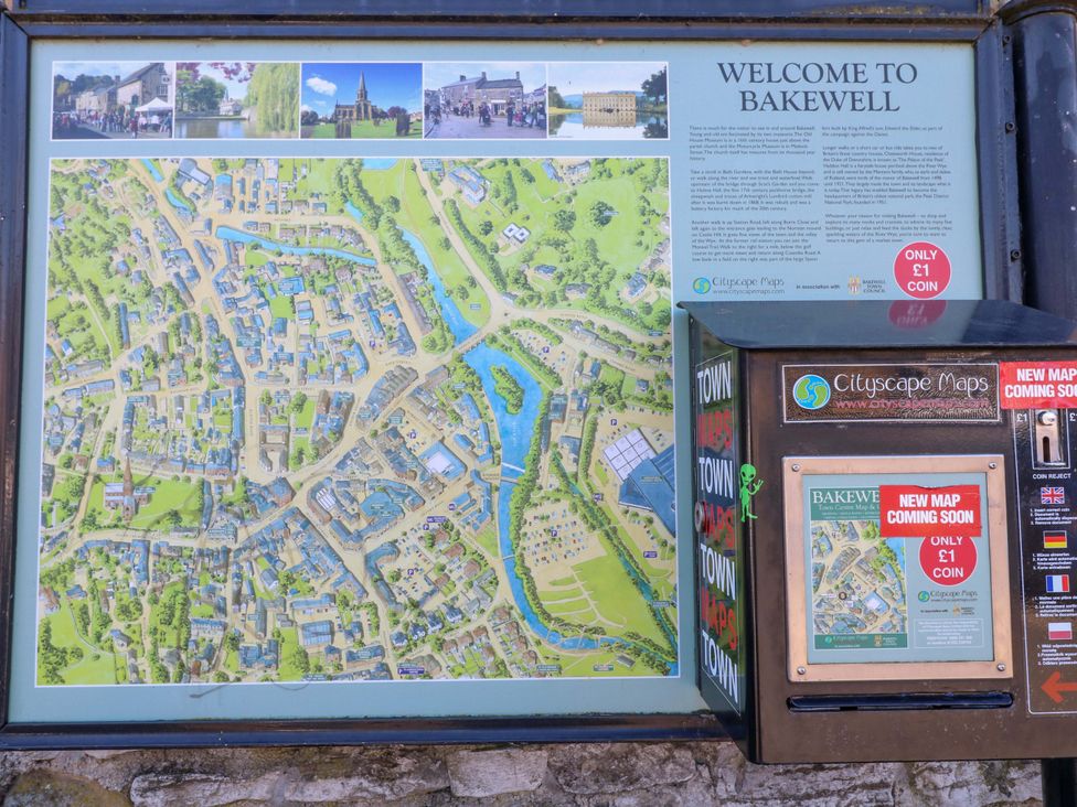 A map and information board in Bakewell showing local attractions and a map dispenser