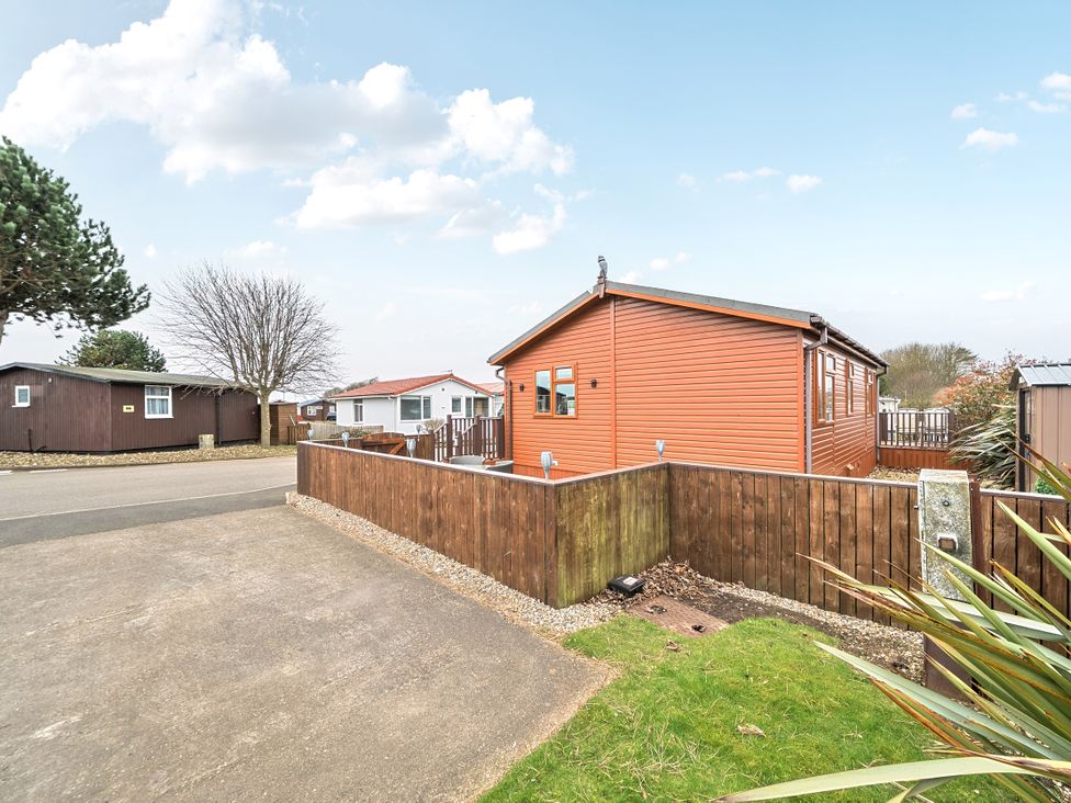 An outdoor view of a house and surrounding area at 311 Bridlington