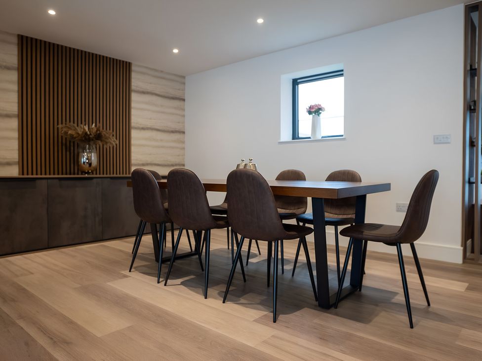 A dining area with a table and chairs at The Galloway in Morpeth