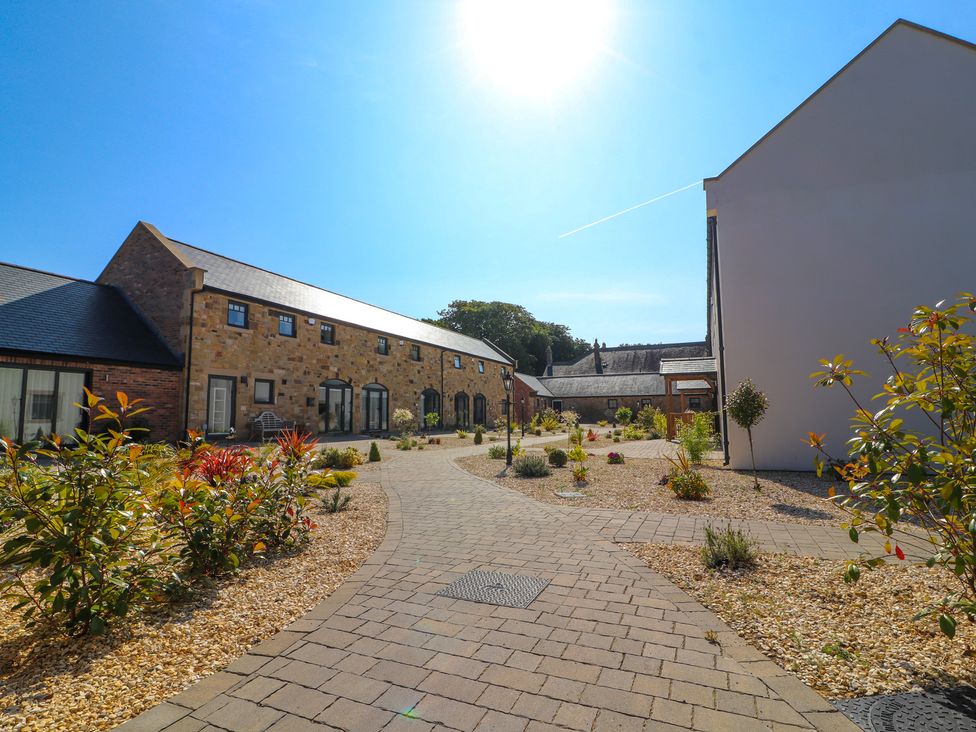 An outdoor area with buildings and pathways at The Shearling in Morpeth