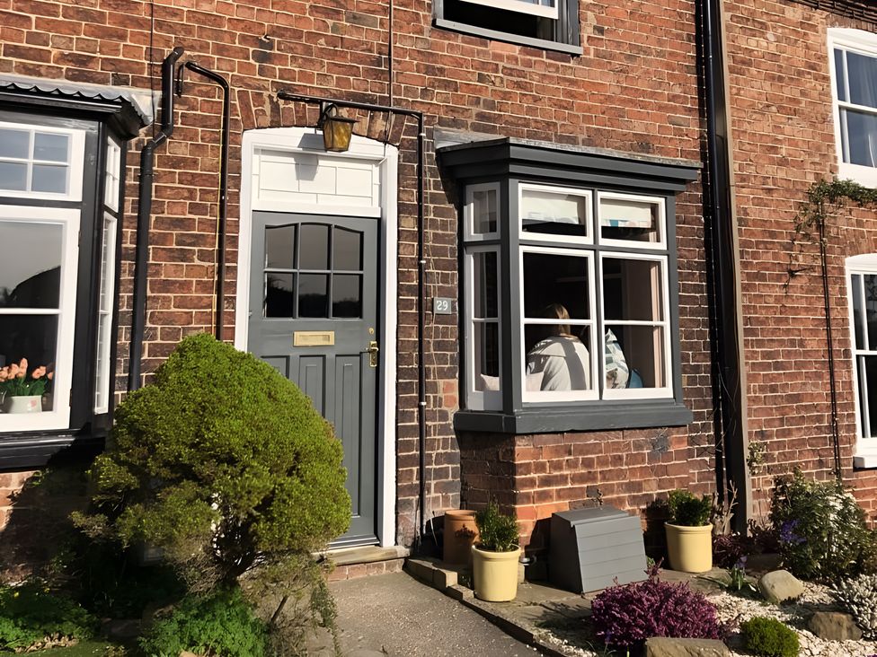 A house entrance with a door and window at 29 Front Street Market Rasen