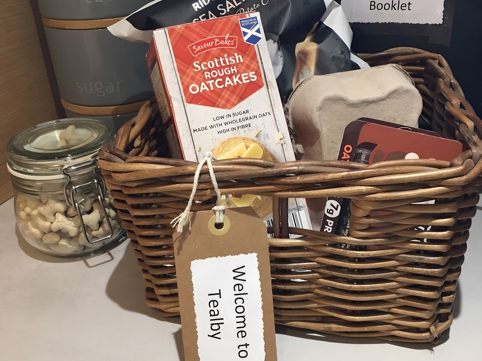 A basket with snacks and a welcome tag at 29 Front Street, Market Rasen