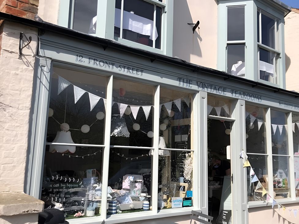A tearoom exterior with decorative bunting at The Vintage Tearooms in Market Rasen