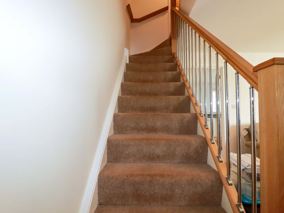 A staircase leading to an upper level at 21 Greenwix Parc 