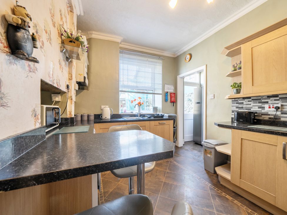 A kitchen with a counter and various appliances at Sea View Escape in Penmaenmawr