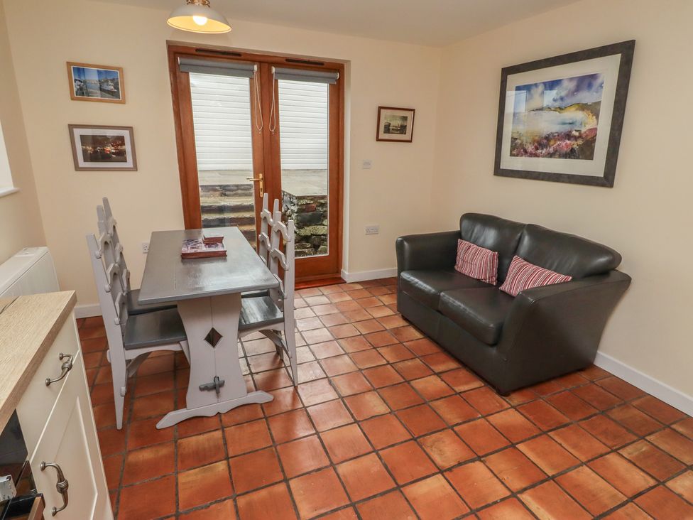 A dining room with a table and chairs at Sunny Brae in Alnwick