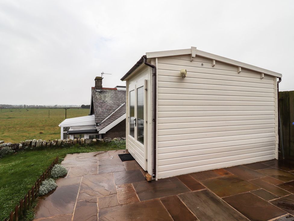 A building with a patio and view of fields at Sunny Brae in Alnwick