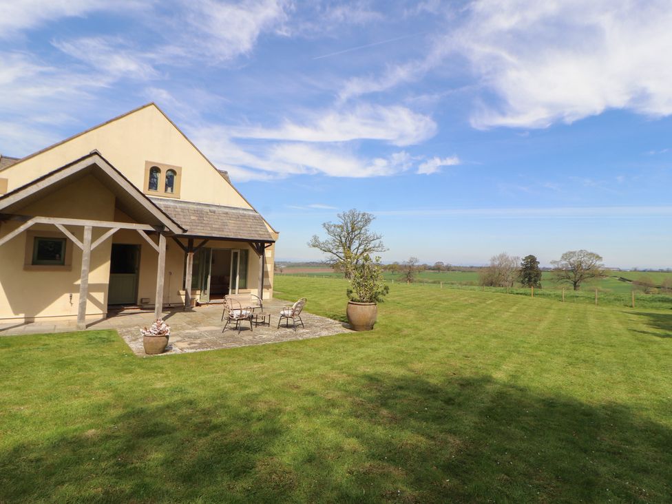 A house with patio furniture in the garden at Thimble Hill Near Armathwaite