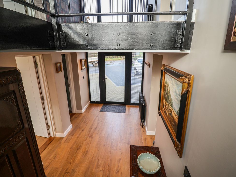 A hallway with a door and window at Unit 1 Ipswich