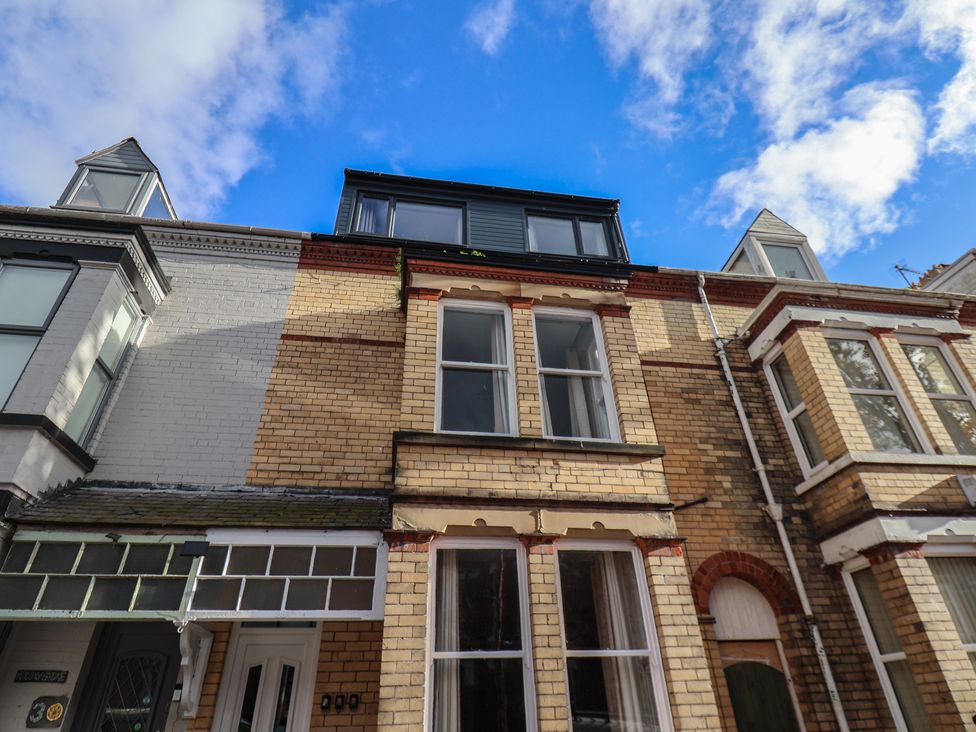 A building exterior with multiple windows and doors at Apartment 2, Blackburn Heights Bridlington