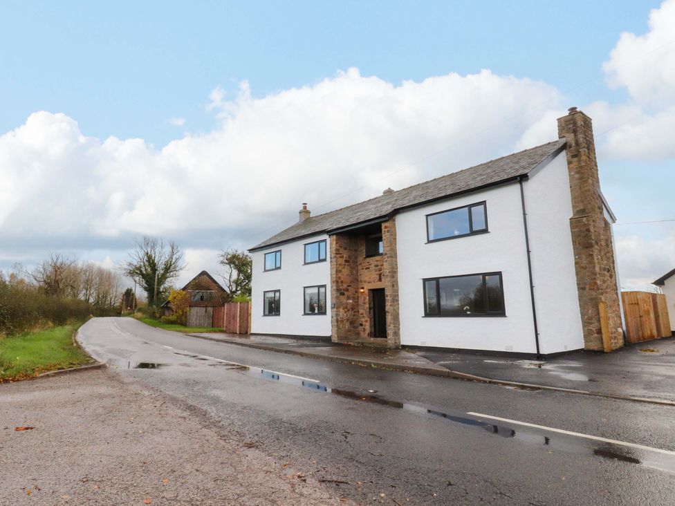 A house beside a road with a fence at Brook House in Broughton, Lancashire