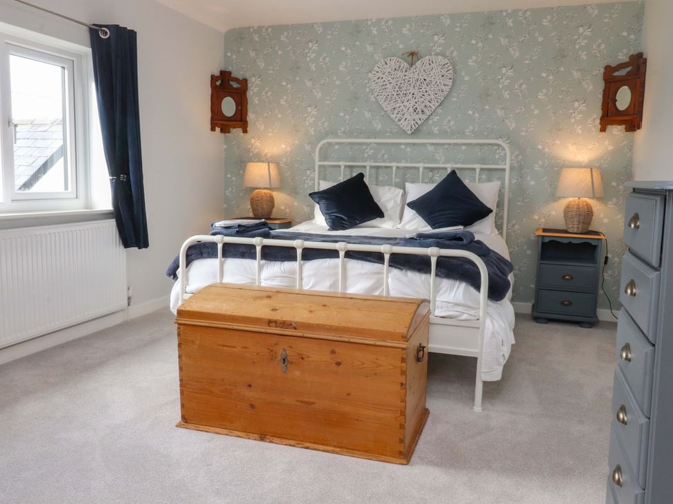 A bedroom with a bed and chest at Brook House in Broughton, Lancashire