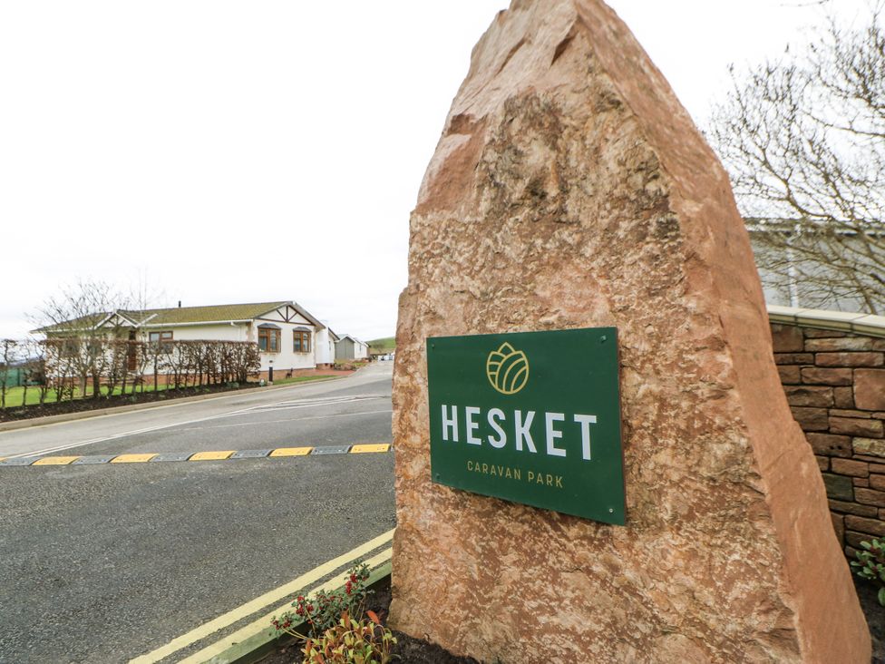 A stone sign for Hesket Caravan Park in Carlisle