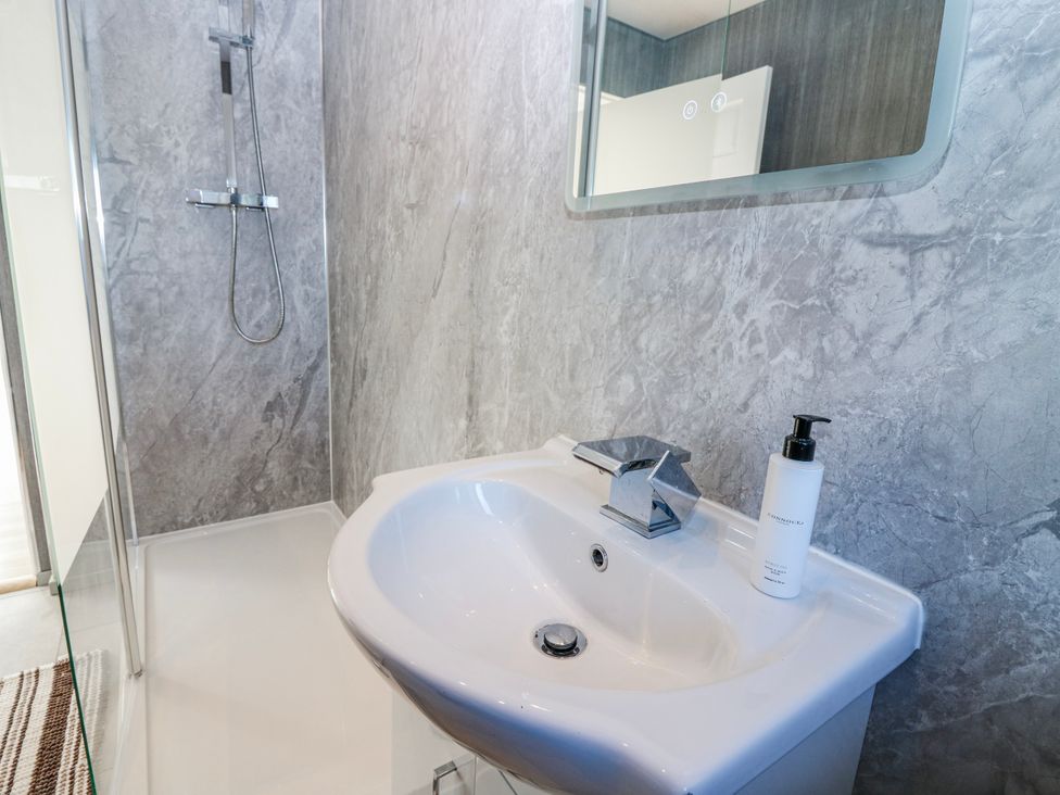 A bathroom with a sink and shower at Norwood