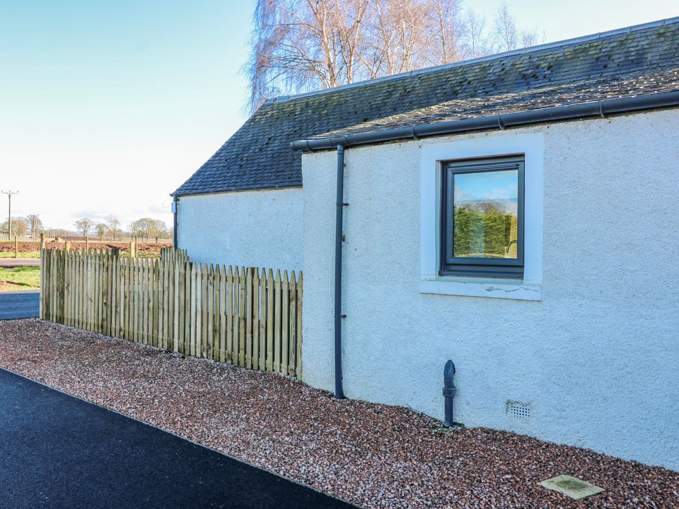 An exterior view of a house with a fence and a window at Norwood