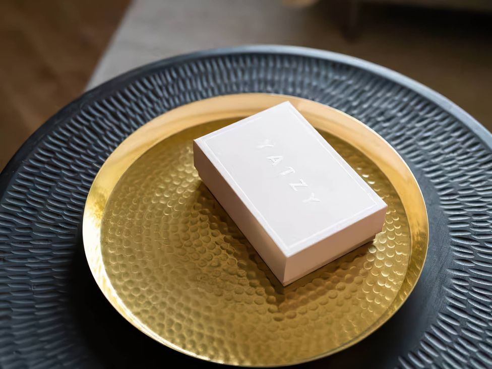 A box on a gold plate at Wren Cottage in Llangaffo