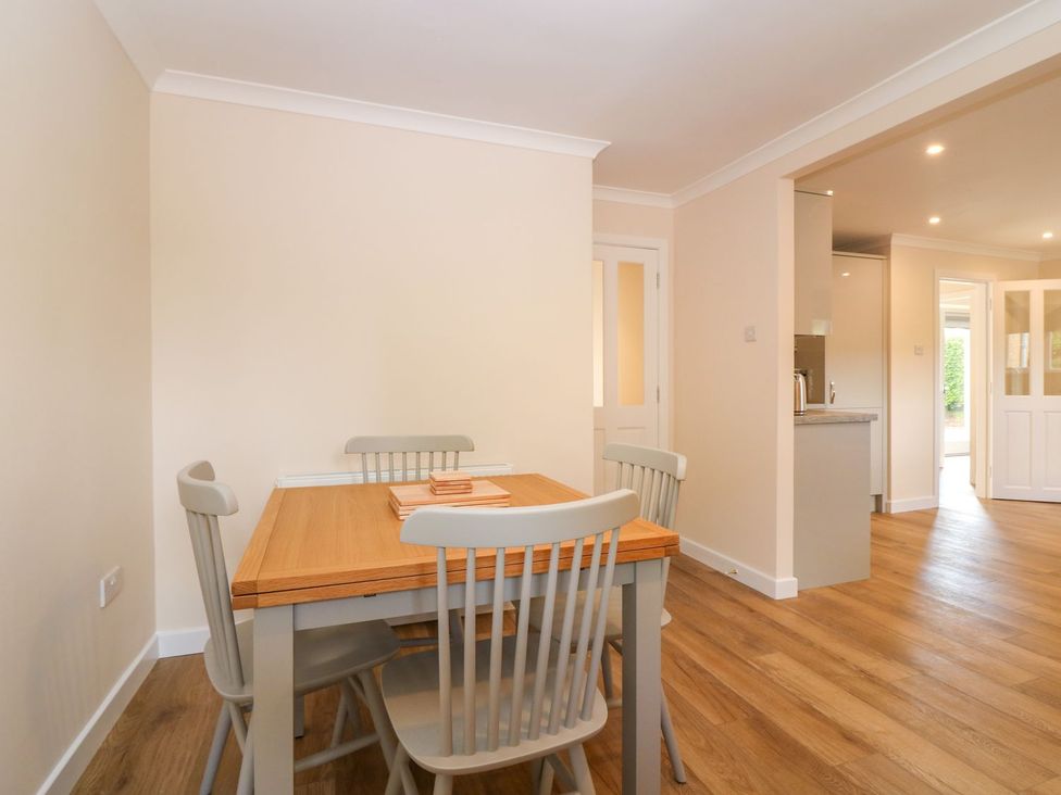 A dining room with a table and chairs at Bankhead Of Lour Cottage Forfar