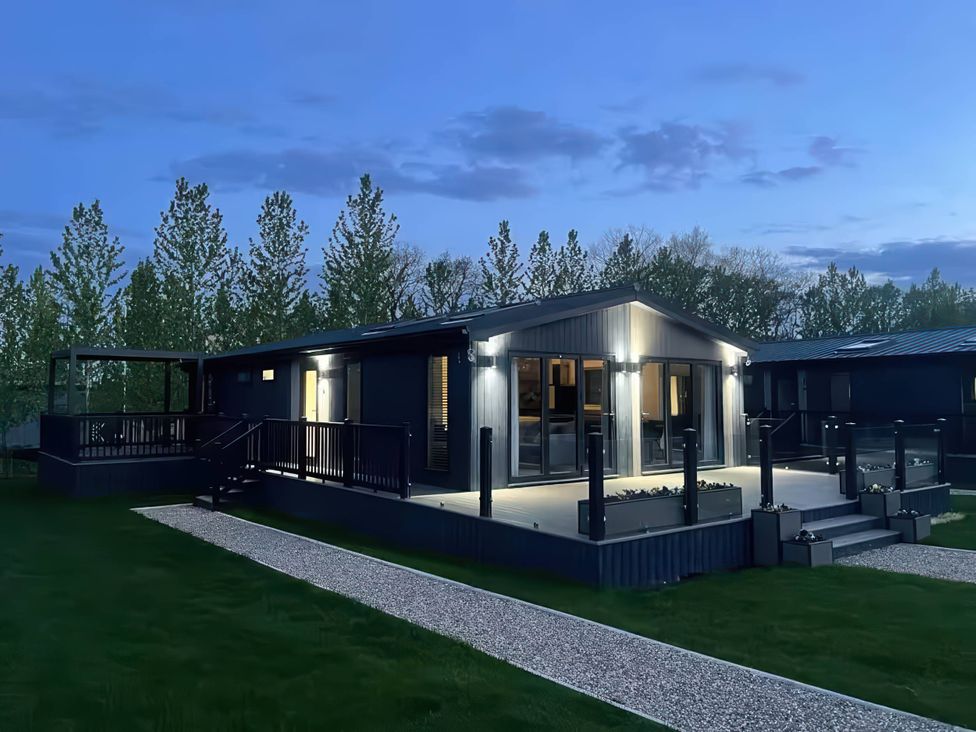 A lodge with decking in Wombleton located at Isca Lodge - With Decking - Lodge 1