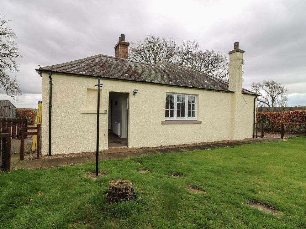 A bungalow with a path and lawn at Bankhead Of Lour Bungalow