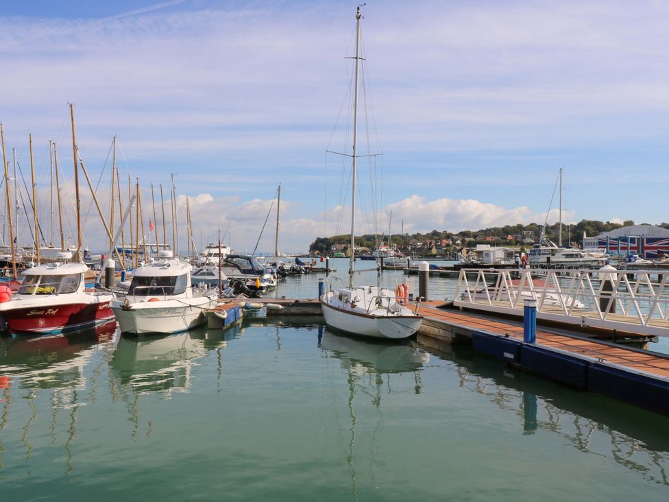 A marina with boats docked at the pier at 53 Orchard Place 