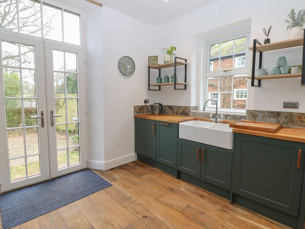 A kitchen with a sink and countertop at Broadwath Old House in Heads Nook