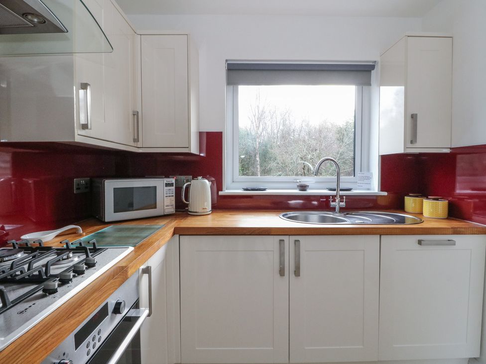 A kitchen with a sink and stove at Sealladh in Appin