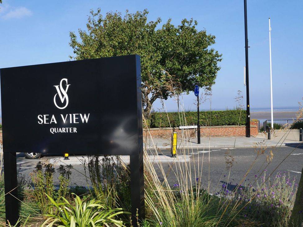 A sign for Sea View Quarter with landscaping in front in Cleethorpes