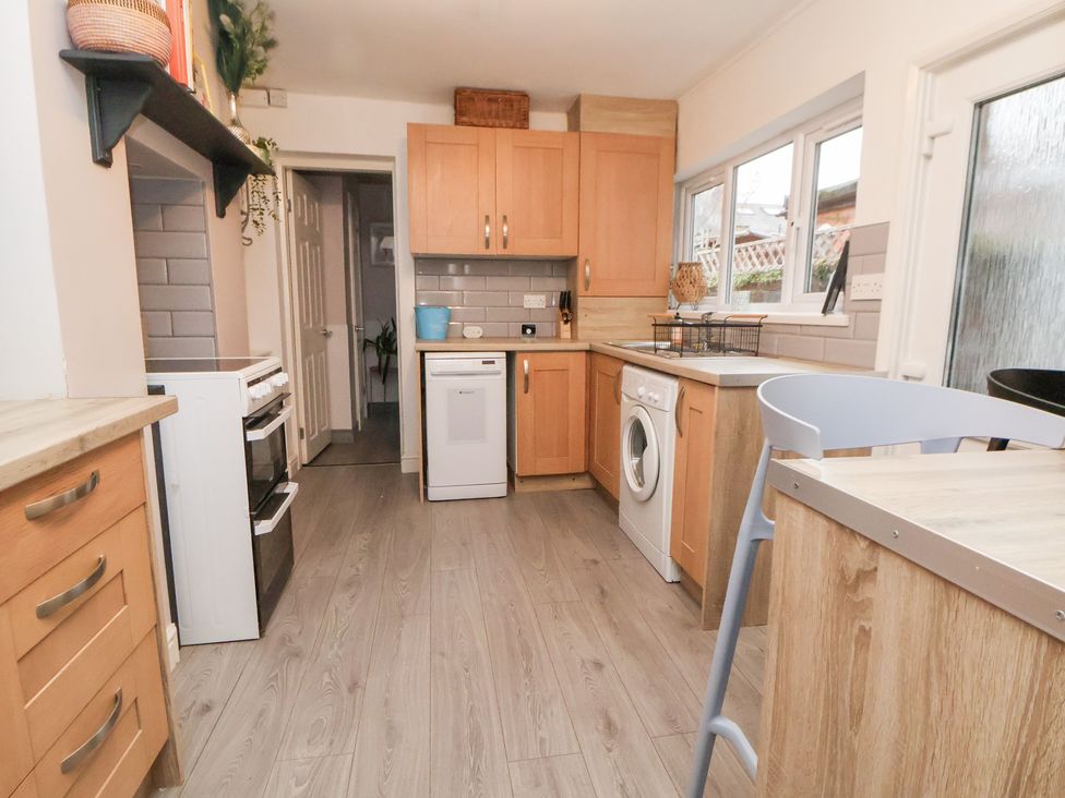 A kitchen with cabinets and appliances at 50 Gladstone Avenue Chester