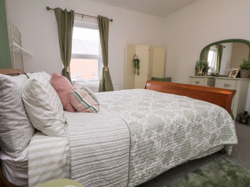 A bedroom with a bed and a dresser at 50 Gladstone Avenue Chester