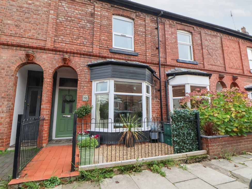 A front view of a house with a garden at 50 Gladstone Avenue Chester