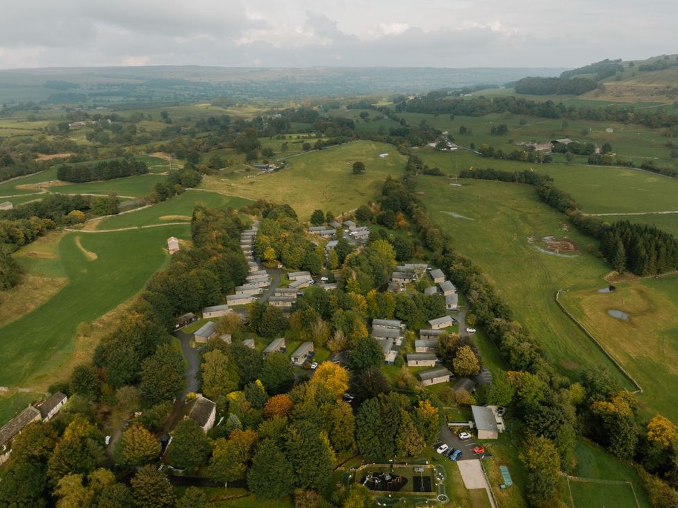 An aerial view of houses and fields at Middleham (Pet) Aysgarth