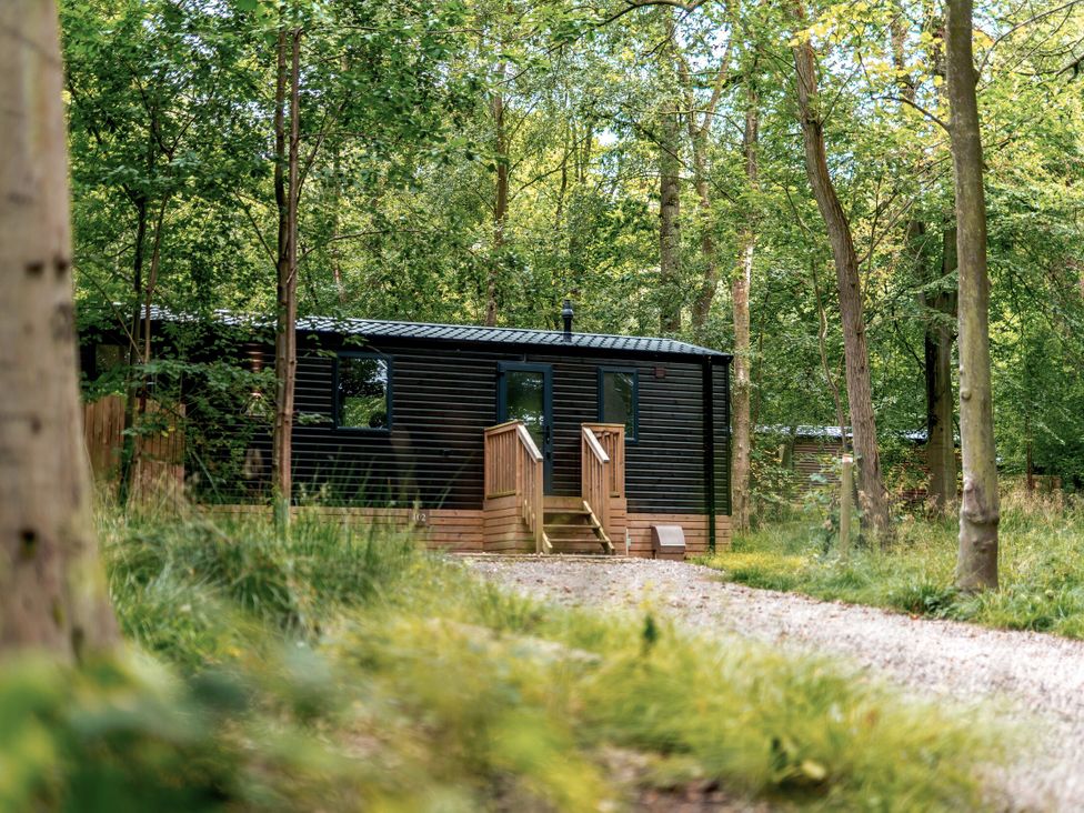 A cabin with stairs and windows at Horncastle Plus (Pet) Louth