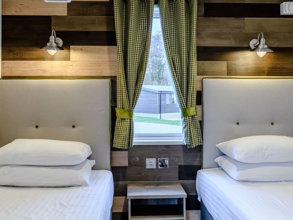 A bedroom with two beds and a window at Alford WF in Louth