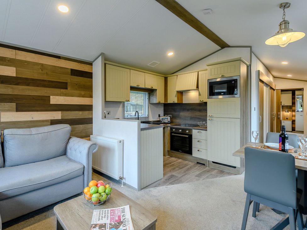 A kitchen with appliances and seating area at Alford WF, Louth