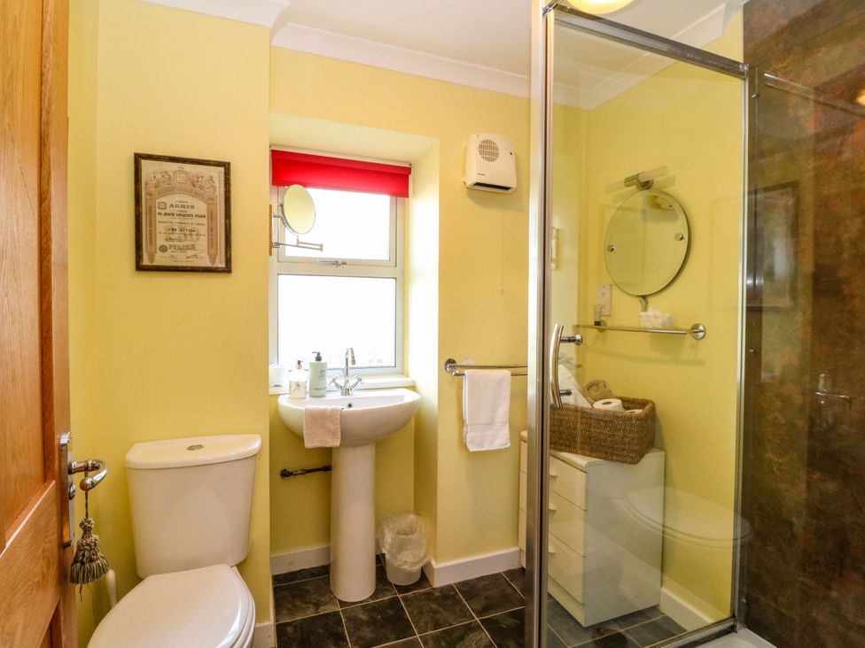 A bathroom with a sink and shower at 78 Findhorn in Forres