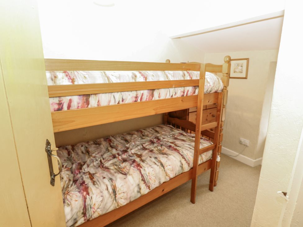 A bunk bed in a bedroom at Ivy Cottage West Burton