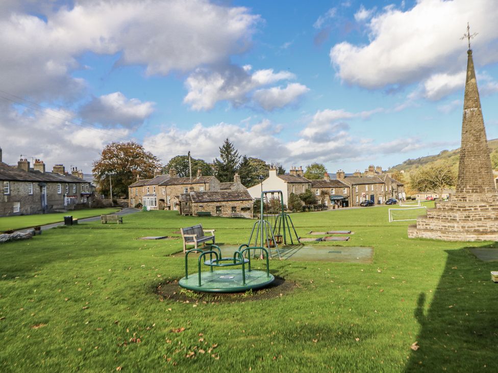 A playground with equipment at Ivy Cottage in West Burton