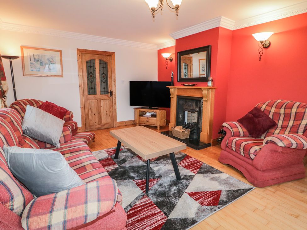 A living room with a sofa and coffee table at Bungalow Falcarragh, Falcarragh, County Donegal