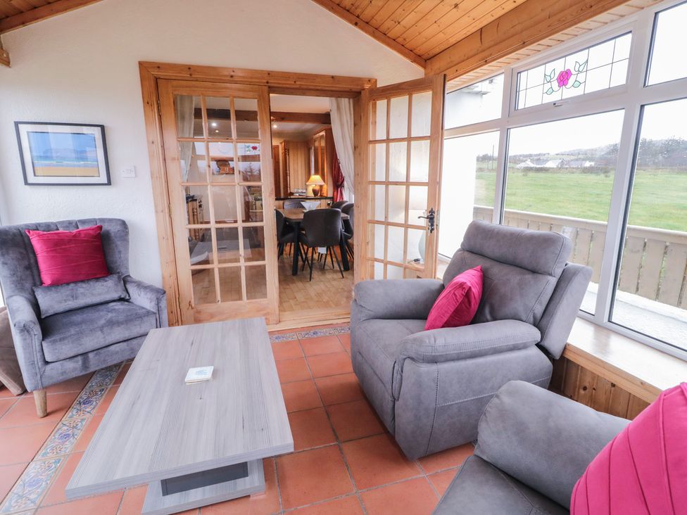 A living room with a sofa and coffee table at Bungalow Falcarragh in Falcarragh, County Donegal