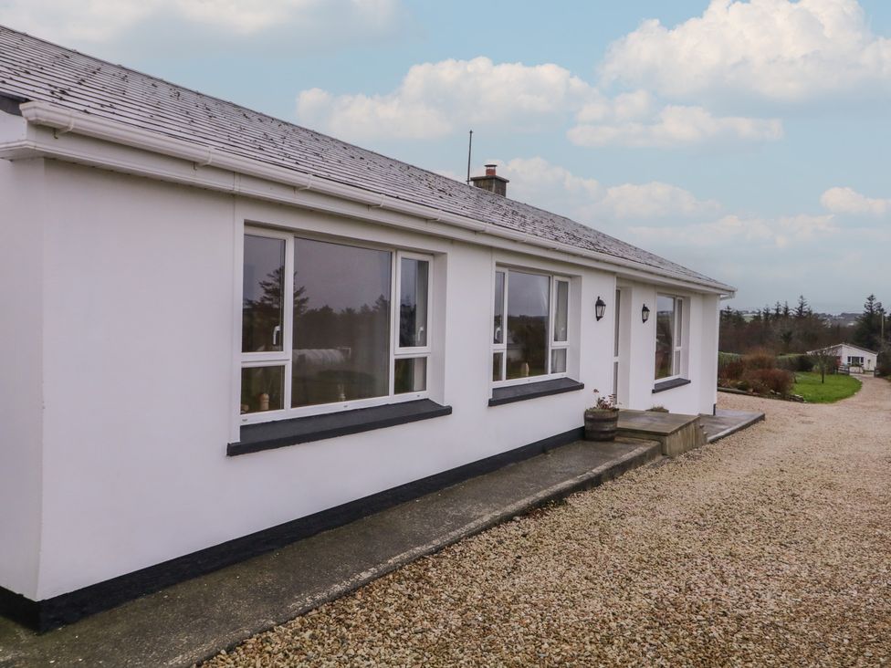 A bungalow facade with windows and front door at Bungalow Falcarragh in Falcarragh, County Donegal
