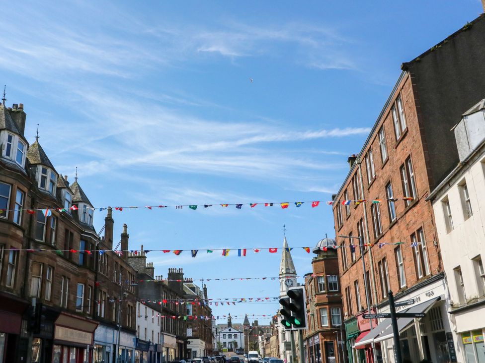 A street scene with buildings and decorations at Flat 1 in 
