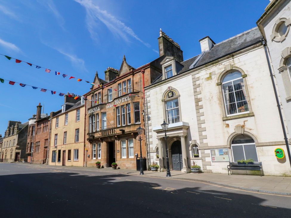 An outdoor view of the Argyle Hotel and adjacent buildings in the street