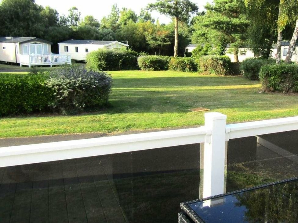 An outdoor area with grass and caravans at Seton Sands Caravan Park - Holiday Accommodation 13391 Cockenzie And Port Seton