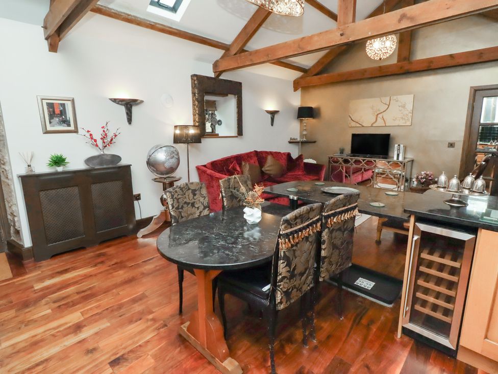 A living room with furniture and decor at The Opulent in Hexham