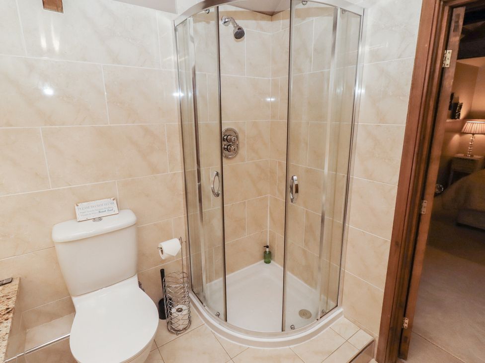 A bathroom with a shower and toilet at The Classic in Hexham