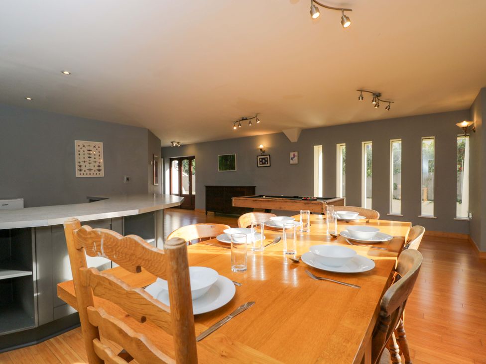 A dining room with a table set for meals at Lady Of Lourdes in Whitchurch, Herefordshire